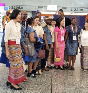 Delegates at ICN Congress, in national dress, before opening ceremony. 